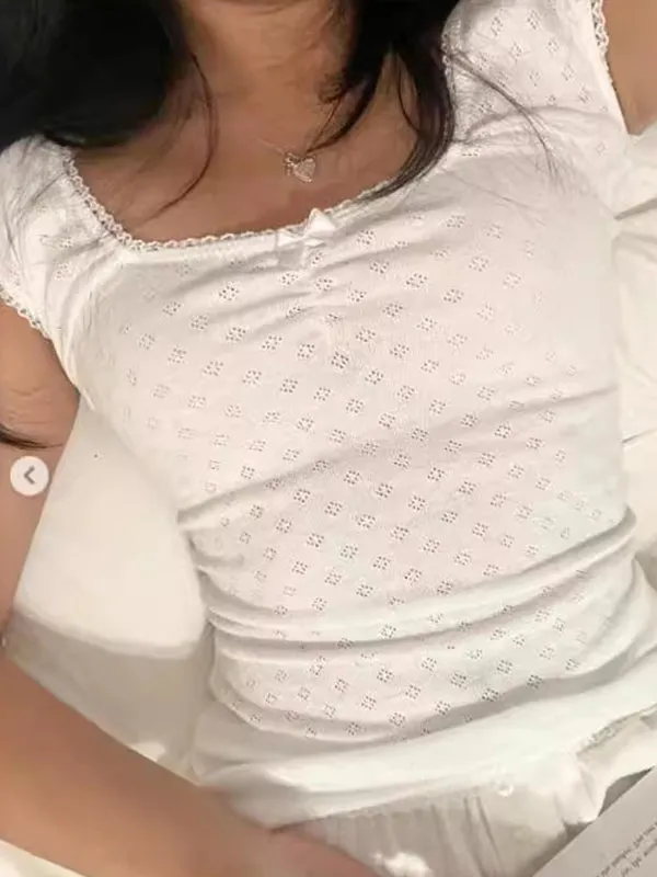 White ruffle top with square neck and short sleeves